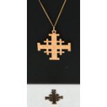An 18ct gold Jerusalem cross on an 18ct gold chain; together with a similar smaller example, the
