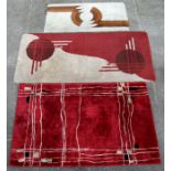 Three mid century Art Deco style hand knotted woollen rugs, the largest 190 by 92cms (3).