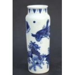 A Chinese blue & white vase of cylindrical form decorated with a dragon and phoenix, 34cms high.
