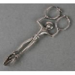 A pair of Victorian novelty silver sugar nips in the form of a harlequin with coiled serpent hoop