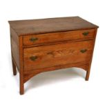 An elm chest of two long drawers, 87cms wide.