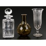 A square shaped cut glass decanter and stopper, a Victorian etched glass vase and a glass carafe
