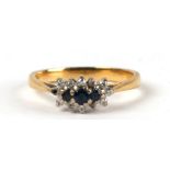 An 18ct gold diamond and sapphire ring, approx UK size 'Q', 3.7g.