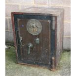 A late 19th / early 20th century steel floor standing Milners safe with key