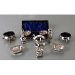 A pair of Victorian silver shell shaped salts and spoons, Chester 1896, cased; together with similar