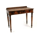 A Victorian satin birch writing table with two frieze drawers, on turned legs, 92cms wide.