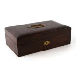 An early 20th century faux crocodile skin leather vanity box with fitted interior, 28cms wide.