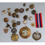 A Royal Wiltshire Yeomanry WWI trench art pendant; together with various buttons and cap badges.