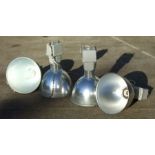 A set of four Thorlux metal industrial style pendant ceiling lights with glass shades, Cat. No.