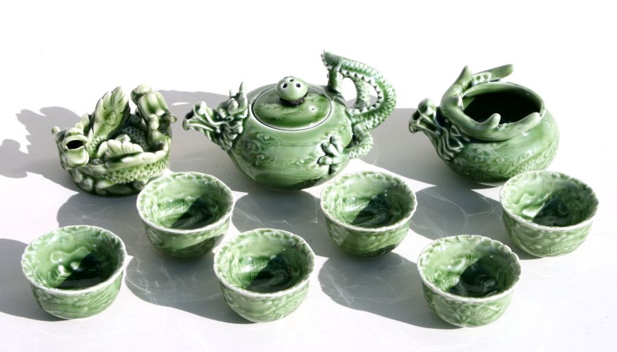 A Chinese green glazed tea set with dragon decoration. - Image 2 of 2