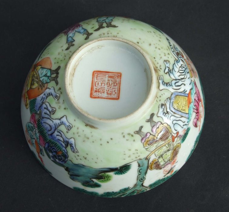 A Chinese famille rose bowl decorated with figures in a landscape, red seal mark to the underside, - Image 2 of 2