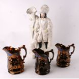 A set of three Victorian lustre ware jugs, the largest 18cms high; together with a Staffordshire