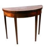 A 19th century figured mahogany demi-lune card table on square tapering legs. 91cm wide