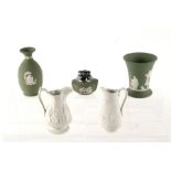 A Wedgwood green Jasperware table lighter, 8cms wide; together with two Jasperware vases and two