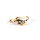 A 9ct gold dress ring set with three white stones, approx UK size 'T', 1.2g.