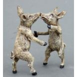 An Austrian cold painted bronze group depicting dancing pigs with Bergman mark, 9cms high.