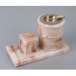 An early 20th century alabaster smoker's stand with silver ashtray, (silver 30g) 22cms wide.