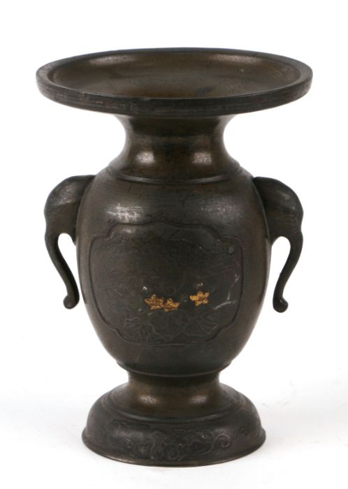 A Japanese bronze and mixed metal vase with stylised elephant handles, 14cms high.