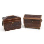 An early 19th century rosewood tea caddy of sarcophagus form, 19cms wide; together with a dome