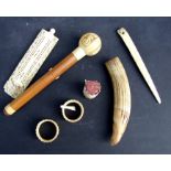 A 19th century Chinese ivory cribbage board (a/f) an ivory topped walking cane handle and other