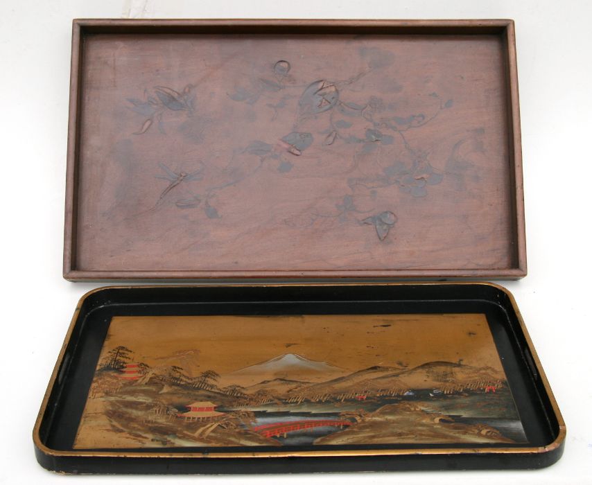 A Japanese black lacquer and gilt tray decorated with a mountainous landscape scene, 60cms wide; - Image 2 of 3