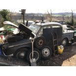 A 1956 Sunbeam Rapier, registration no. SXJ 870 and a Hillman Minx, both for restoration with a