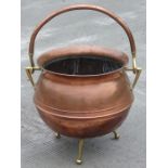 A Dr Christopher Dresser design copper and brass log bin, 33cms high.