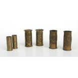 Three pairs of WW1 trench art shell vases. The first with town badges of ALBERT & ARMENTIERES, the