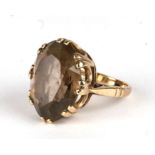 A 9ct gold smoky quartz cocktail ring, approx UK size 'L', 7.7g.