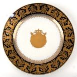 A 19th century Sevres cabinet plate with Napoleon III gilt armorial within a gilt floral border,