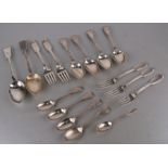A quantity of mainly 19th century silver flatware to include teaspoons, serving spoons and forks,