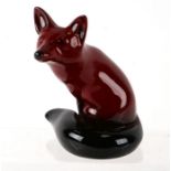 A Royal Doulton flambé figure of a seated fox, 12cms high.Condition ReportGood condition with no