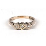 A 9ct gold three-stone diamond ring, approx UK size 'N', 2.2g.