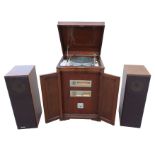 An Edwardian mahogany gramophone case containing modern HIFI equipment, 56cms wide; together with