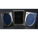 Three modern Turkish sterling silver photograph frames, the largest overall 10 by 13.5cms (3).