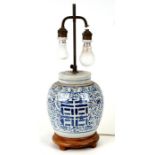 A Chinese blue & white vase and cover, converted to a table lamp, on a hardwood stand, 29cms high.