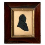 A Regency portrait miniature silhouette of a gentleman in original rosewood frame, overall 16 by