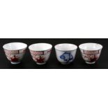 Three Chinese Imari tea bowls decorated with flowers, 5.5cms high; together with a blue & white