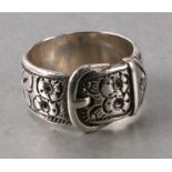 A silver buckle ring with engraved flower decoration, approx UK size 'U'.Condition ReportGeneral