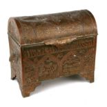 An Islamic copper and brass dome top casket, 30cms wide.