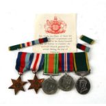 A WWII medal group to include 1939-45 Star, France Germany Star, War Medal, Defence Medal and