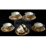 A Royal Crown Derby Gold Aves pattern A1235 tea set comprising six cups and saucers.