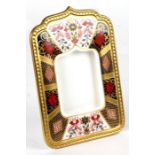A Royal Crown Derby Imari pattern strut photo frame, 12 by 18cms.Condition ReportGood condition with