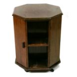 An early 20th century walnut occasional table or drinks cabinet with two cupboards with fitted