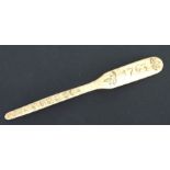 A Prisoner of War art bone marrow spoon. Length 16cms (6.25ins)