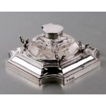 A silver inkwell with double pen stand, Sheffield 1907 and makers mark for Hawksworth & Eyre,