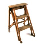 A set of beech three-step folding steps, 41cms wide.Condition ReportGeneral wear commensurate with