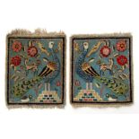 Two Kerman woven mats decorated with birds and flowers, 40 by 45cms (2).