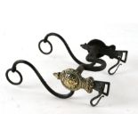 A 19th century Infantry mounted Officer's wrought iron and brass horses bit, 15cms wide.