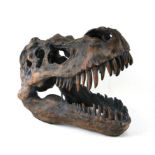 A Tyrannosaurus Rex fossilised head facsimilie with facility to wall mount, approx 53 by 36 by